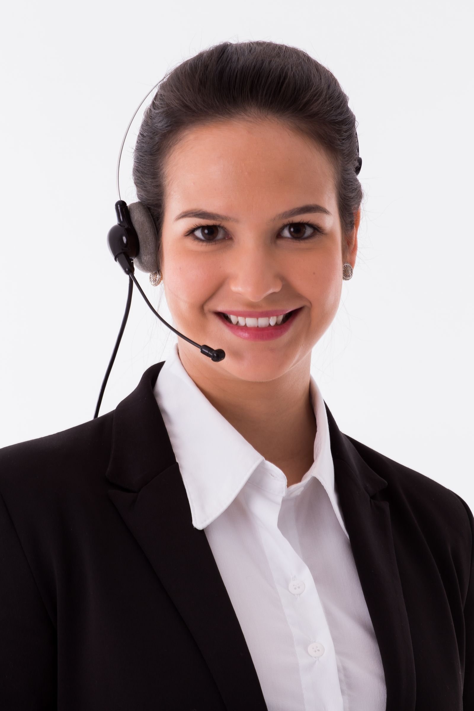A front-desk team member answering with a headset